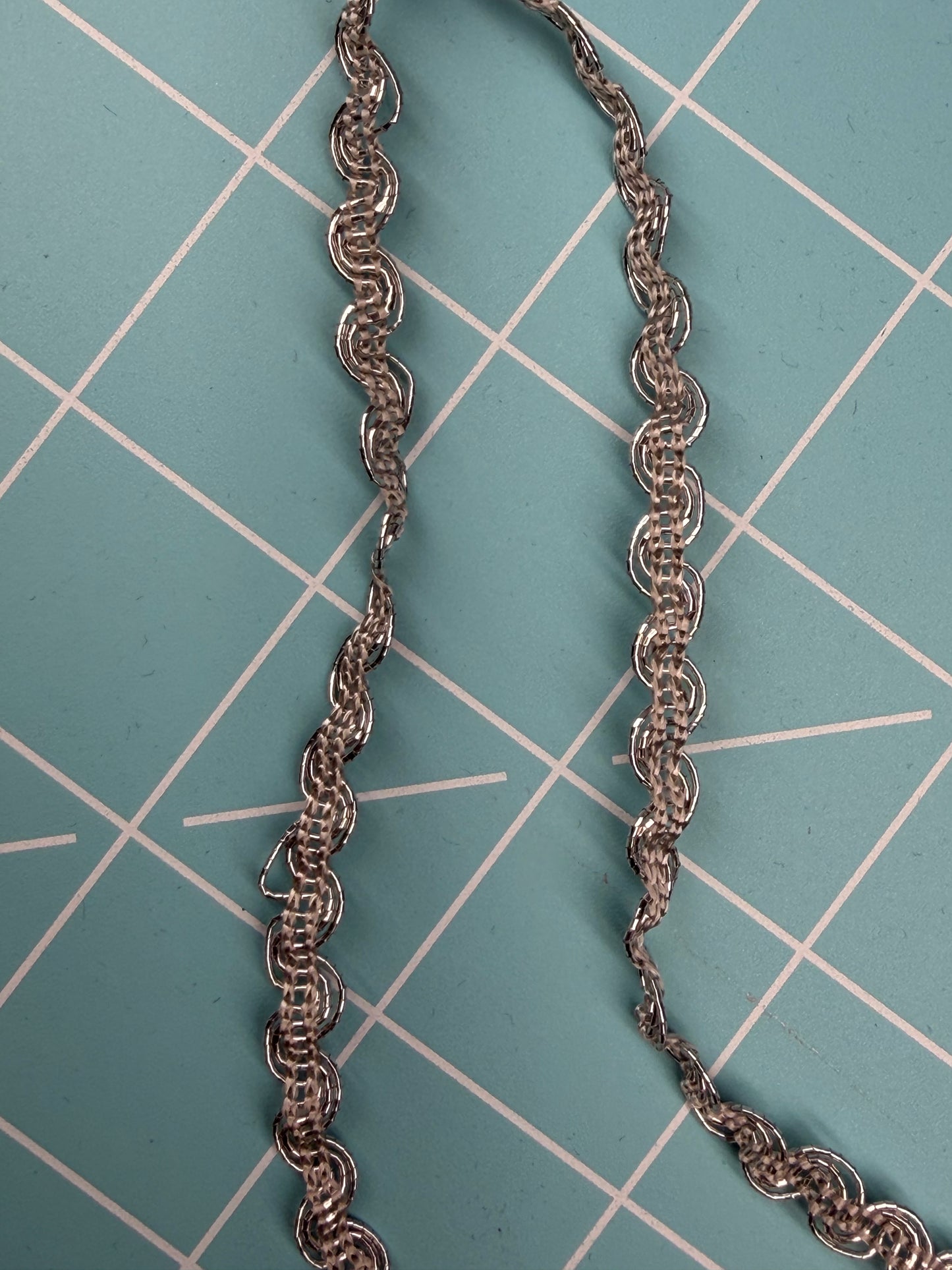 Silver metallic gimp braid 1/4”- 1 yard